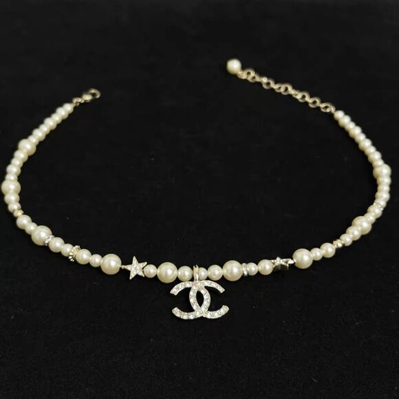 Authentic CHANEL Stylish Star & Pearl Necklace - Picture 2 of 6